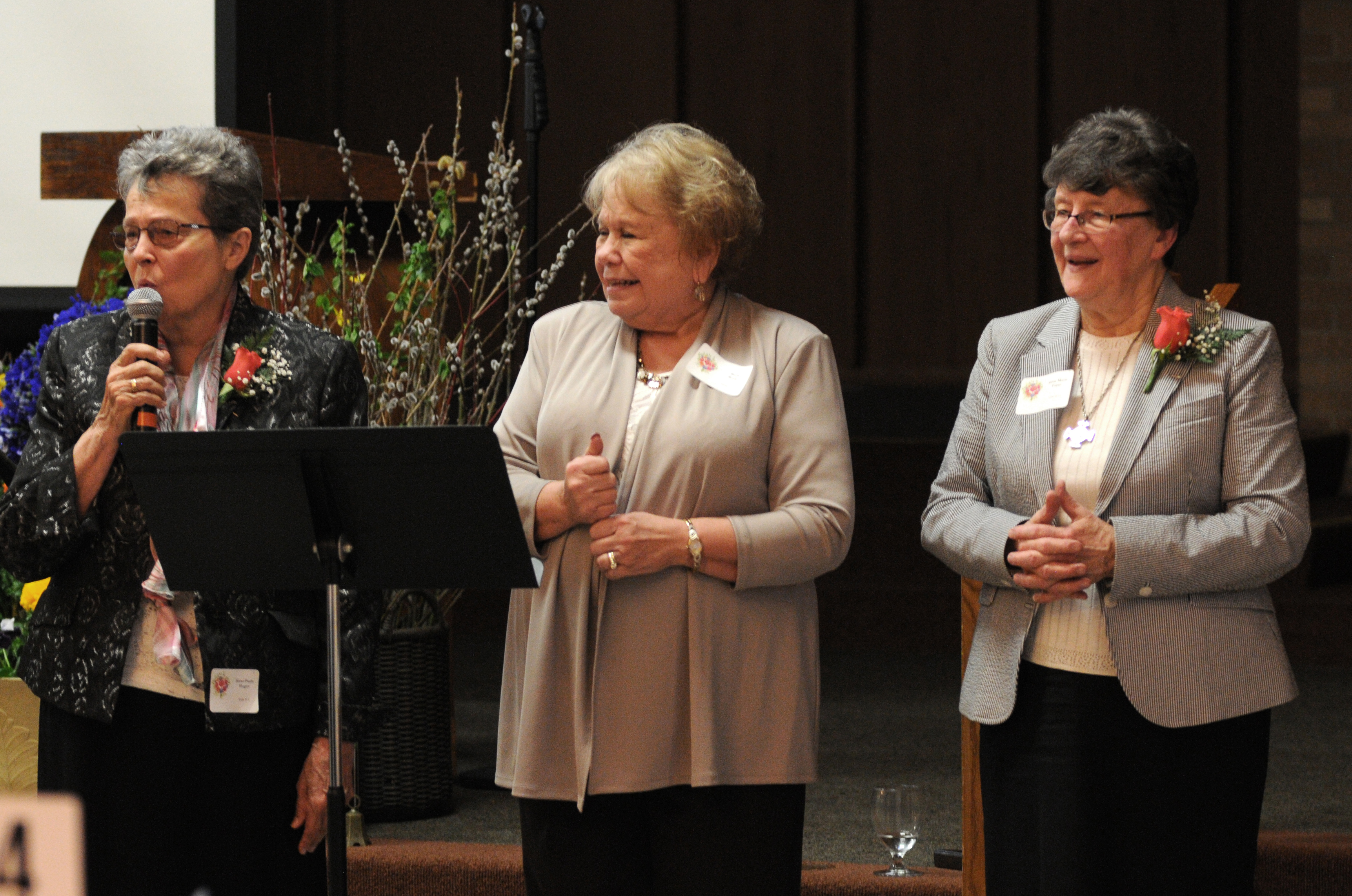 Sisters Paula Hagen and Marie Fujan honor Ms. Barbara Rode (center), President and CEO of Saint Therese Foundation, at the 2018 Prioress Dinner.