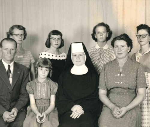 Sister Susan with her entire family. Front row: Peter (dad), Mary, Sister Susan, Susan (mom); back row: Josephine, Patricia, Susan, and Margaret.