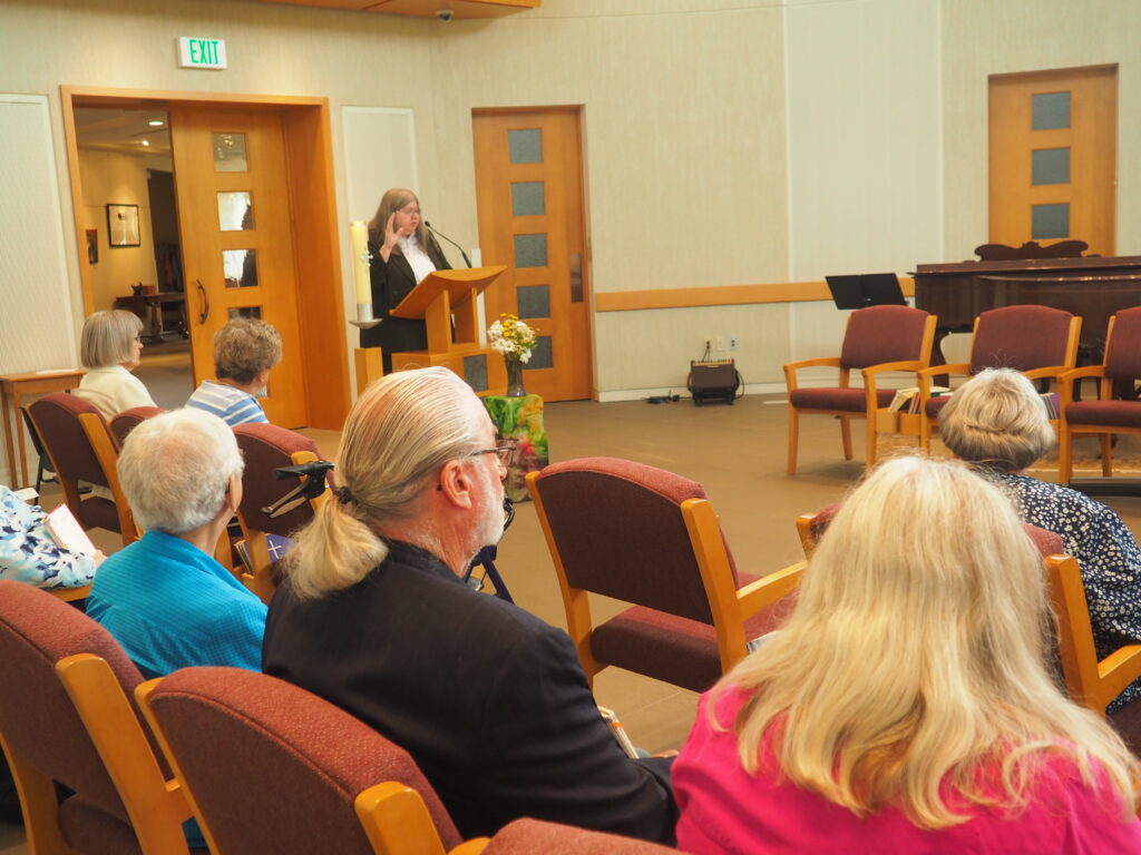 Sister Catherine Nehotte, OSB prays for Monastery volunteers